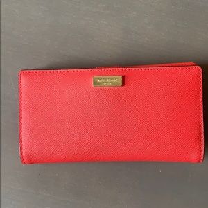 Kate spade Spencer Slim Bifold Wallet - Coral